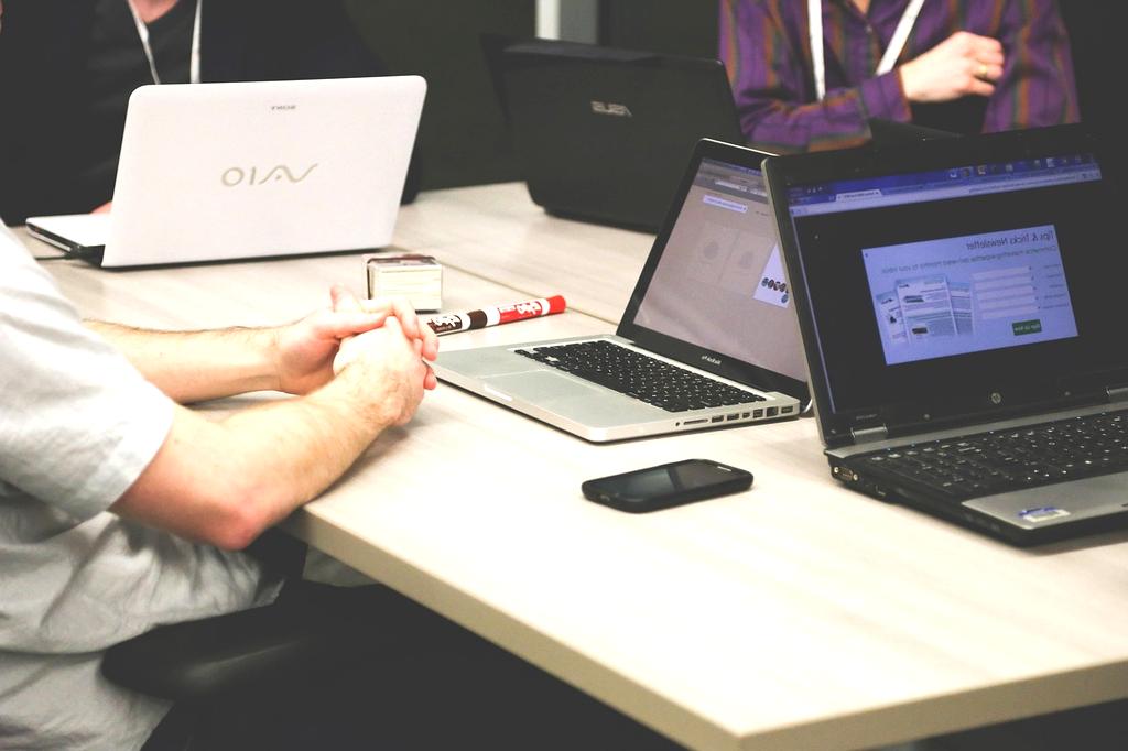 Team collaborating on a digital strategy in a modern office