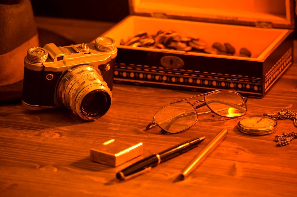 Videographer recording with professional camera equipment